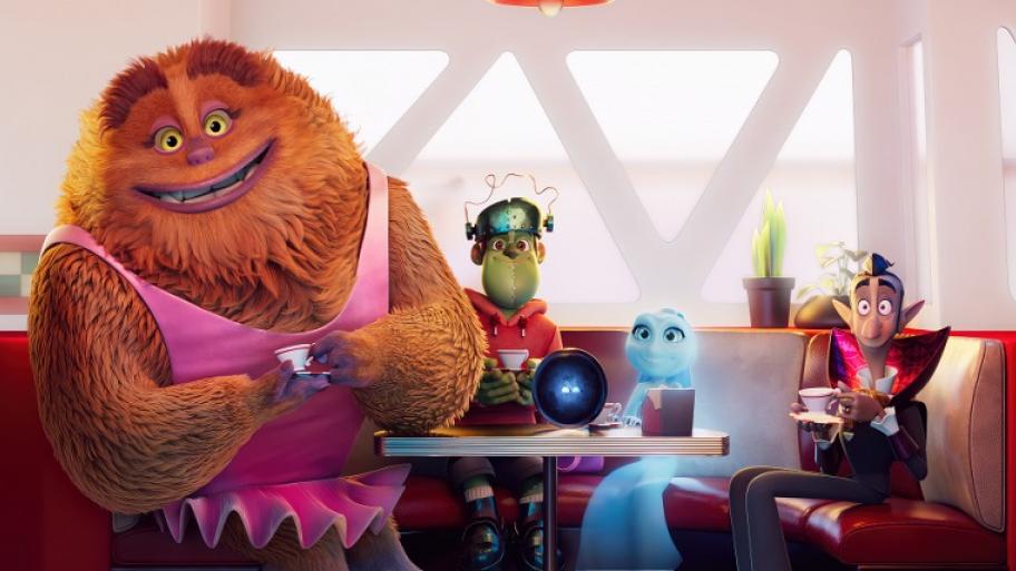 Vier Monster sitzen an einem tisch (Jeti, Frankenstein, Geist und Vampir)
