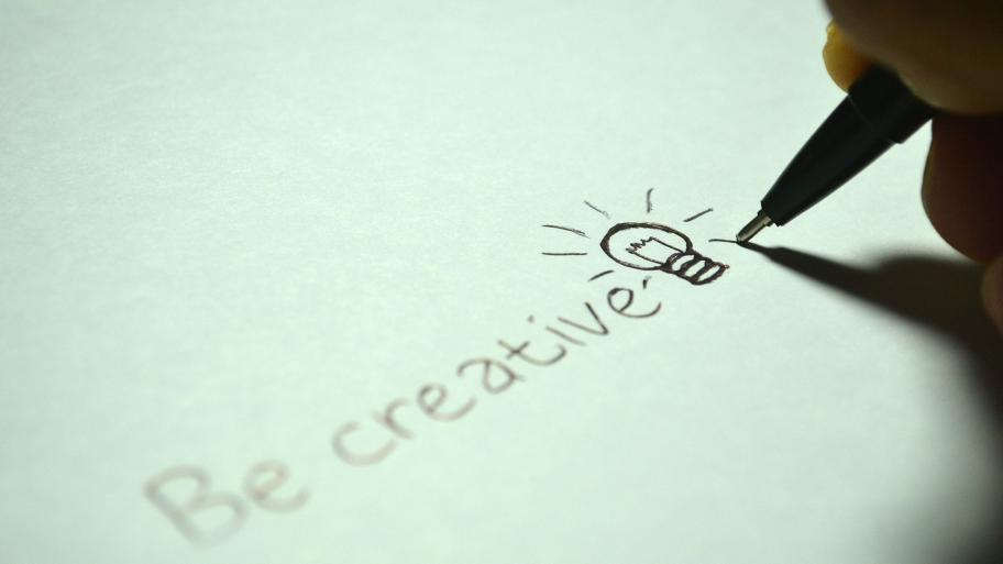 "Be creative", handschriftlich geschrieben 