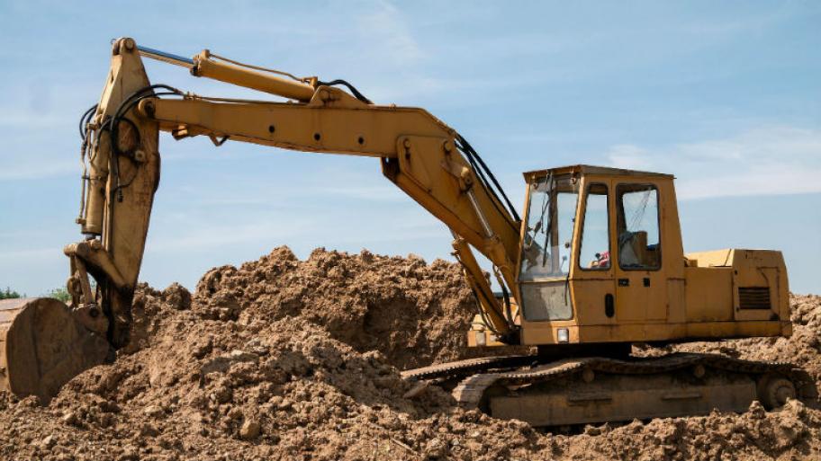 Ein Bagger auf einer Baustelle. 