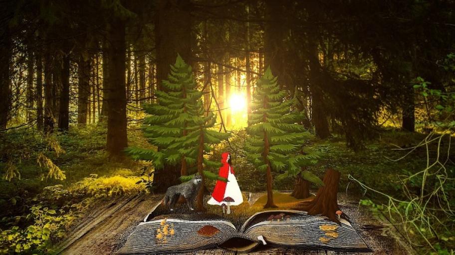 eine colorierte Zeichnung: im Hitergrund Tannebäume, die Sonne scheint von hinten durch die Bäume, im Vordergrund liegt ein dickes, aufgeschlagenes Buch, darauf stehen Rotkäppchen und der Wolf