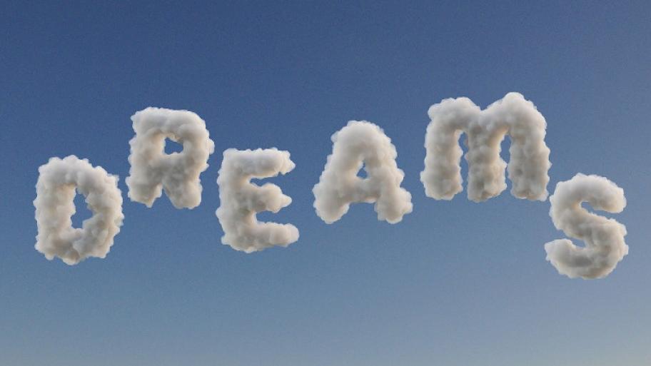 Der Hintergrund ist ein hellblauer Himmel. Im Himmel hängt das Wort "Dreams" in der Luft. Die einzelnen Buchstaben bestehen aus Wolken.