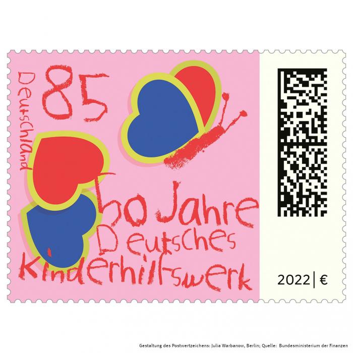 Rosafarbene 85-Cent-Münze mit Schmetterling in rot-blau und der Aufschrift "50 Jahre Deutsches Kinderhilfswerk"